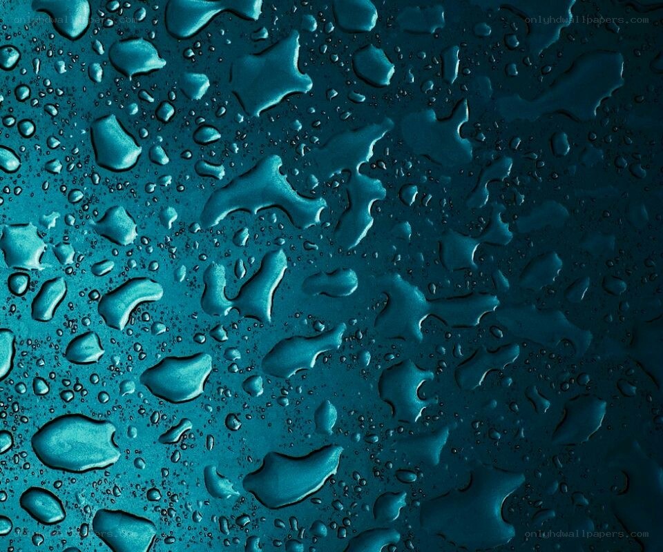 Water droplets on a blue surface