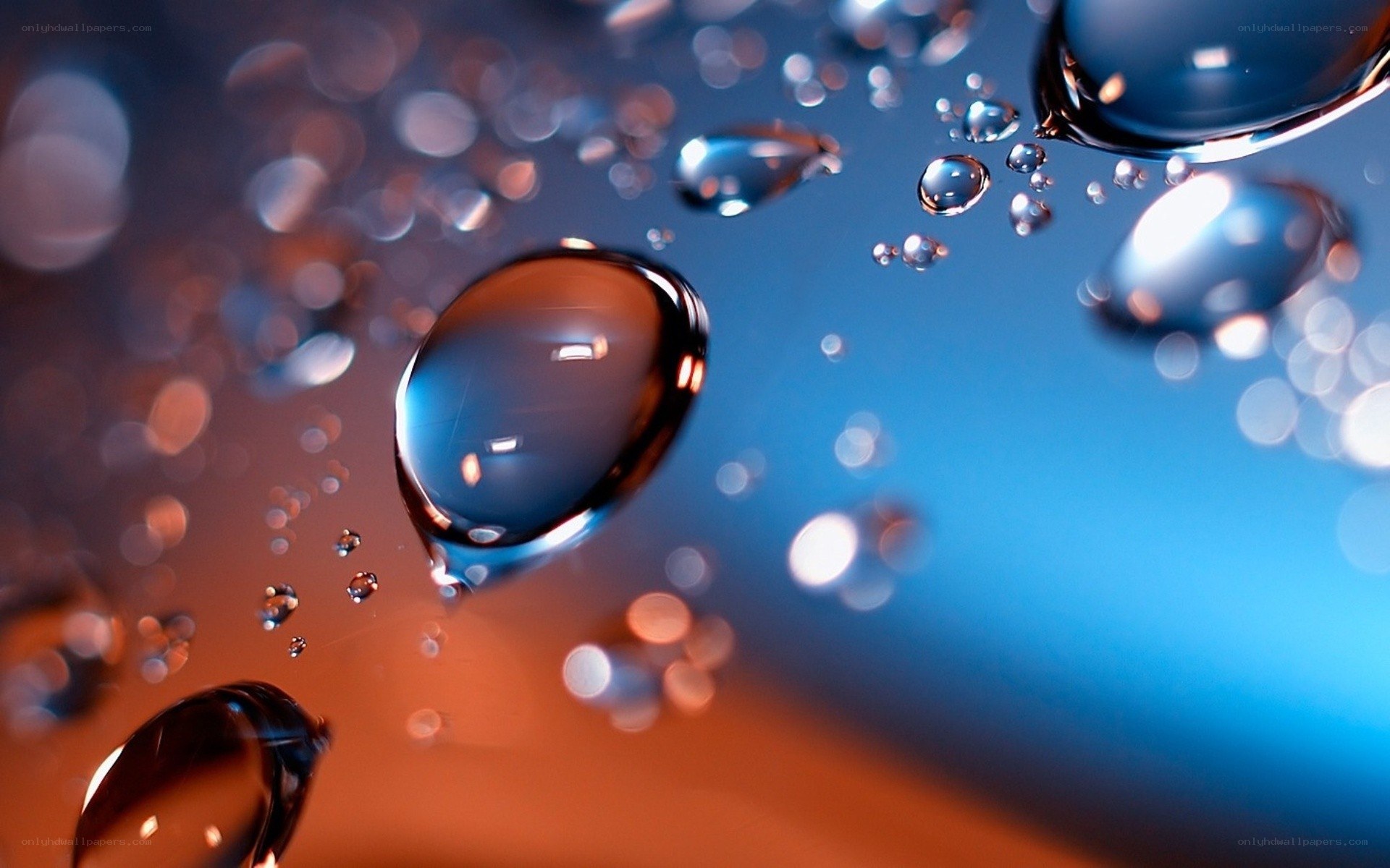 Water droplets on a colorful surface