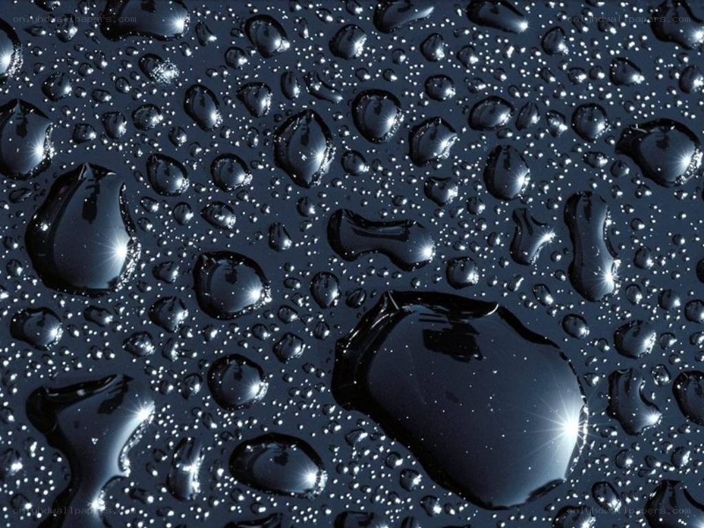 Water droplets on a dark surface