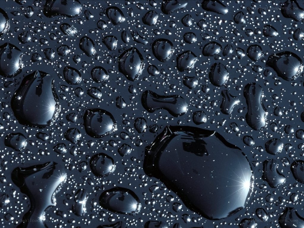 Water droplets on a dark surface
