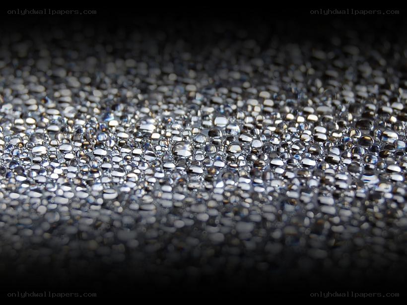 Water droplets on a dark surface