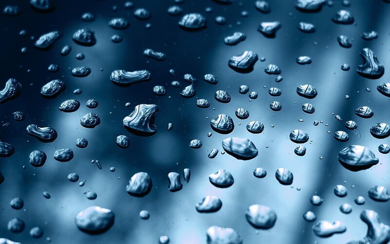 Water droplets on a dark surface
