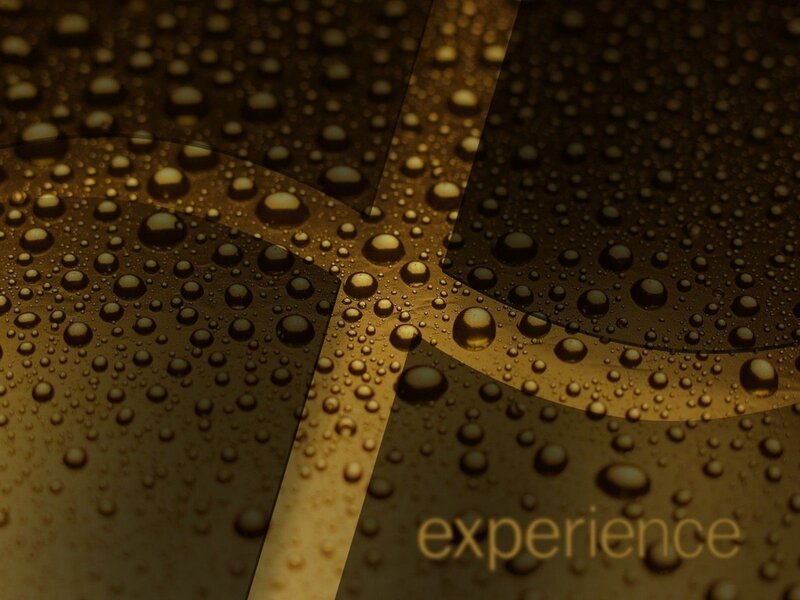 Water droplets on a golden surface
