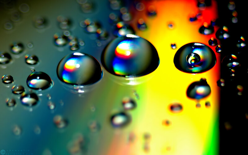 Water droplets on a rainbow surface