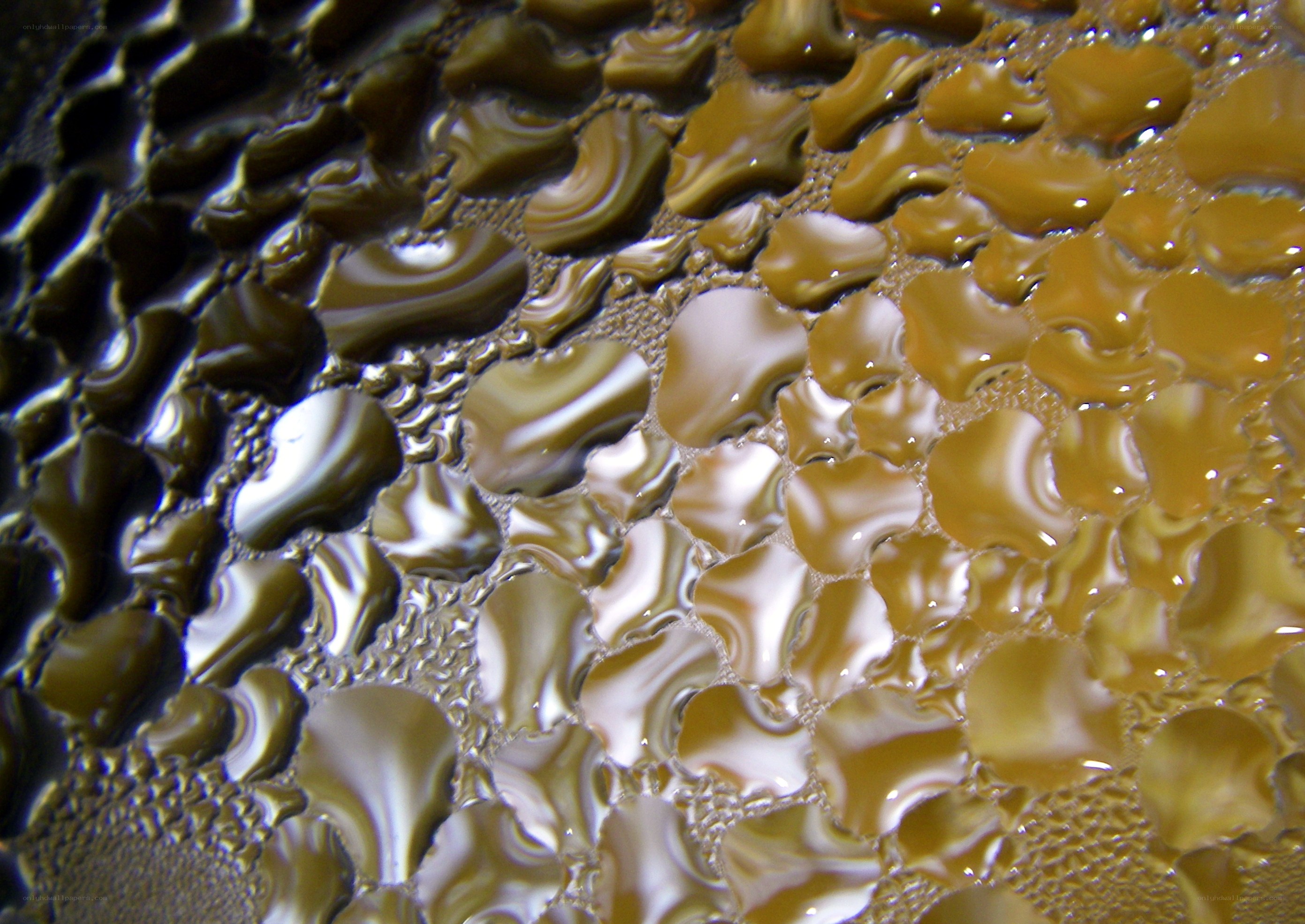 Water droplets on a reflective surface