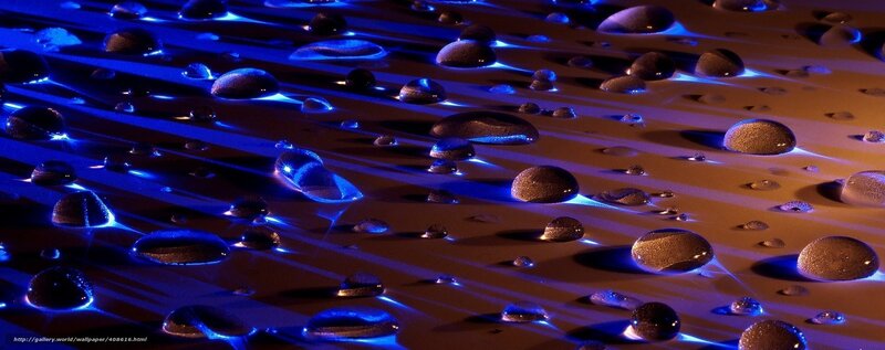Water droplets on a reflective surface