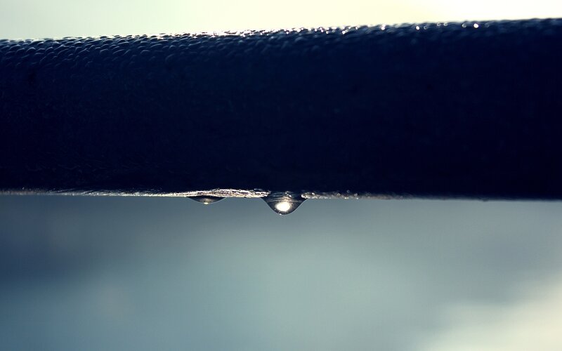 Water Droplets on Black Surface — Calm, Photograph, Droplet