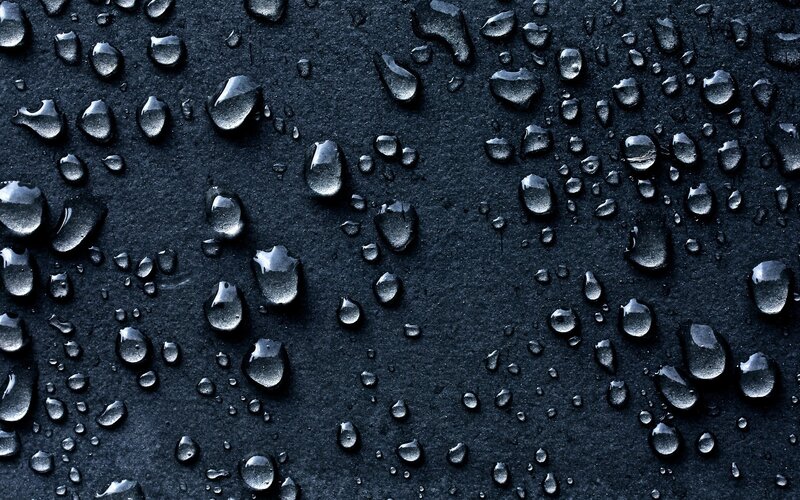 Water Droplets on Black Surface — Calm, Photograph