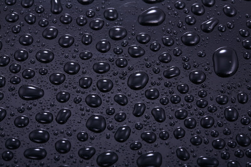 Water Droplets on Black Surface — Calm