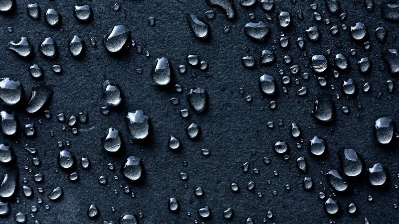 Water Droplets on Black Surface — Photograph, Gray