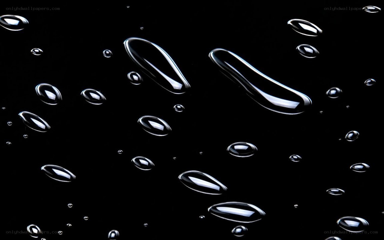Water droplets on black surface