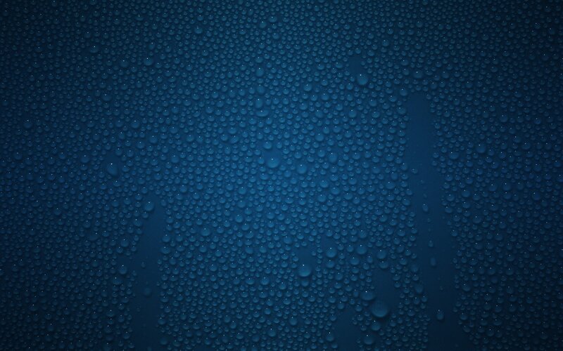 water droplets on blue surface