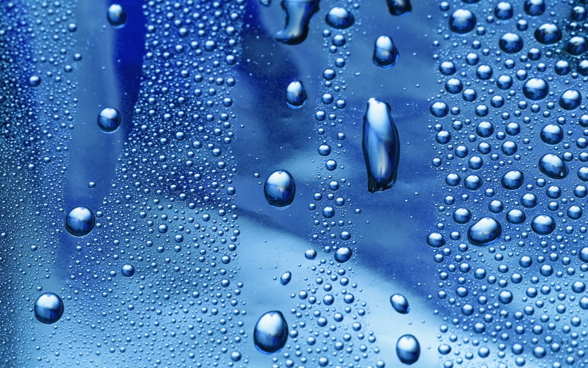 Water droplets on blue surface