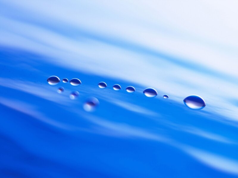 Water droplets on blue surface