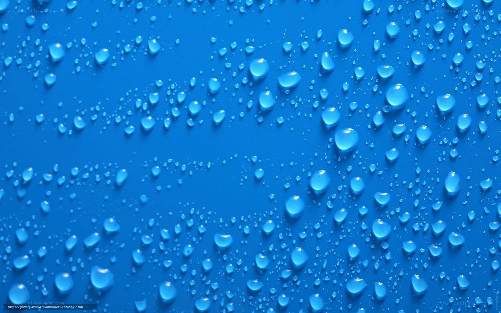 Water droplets on blue surface