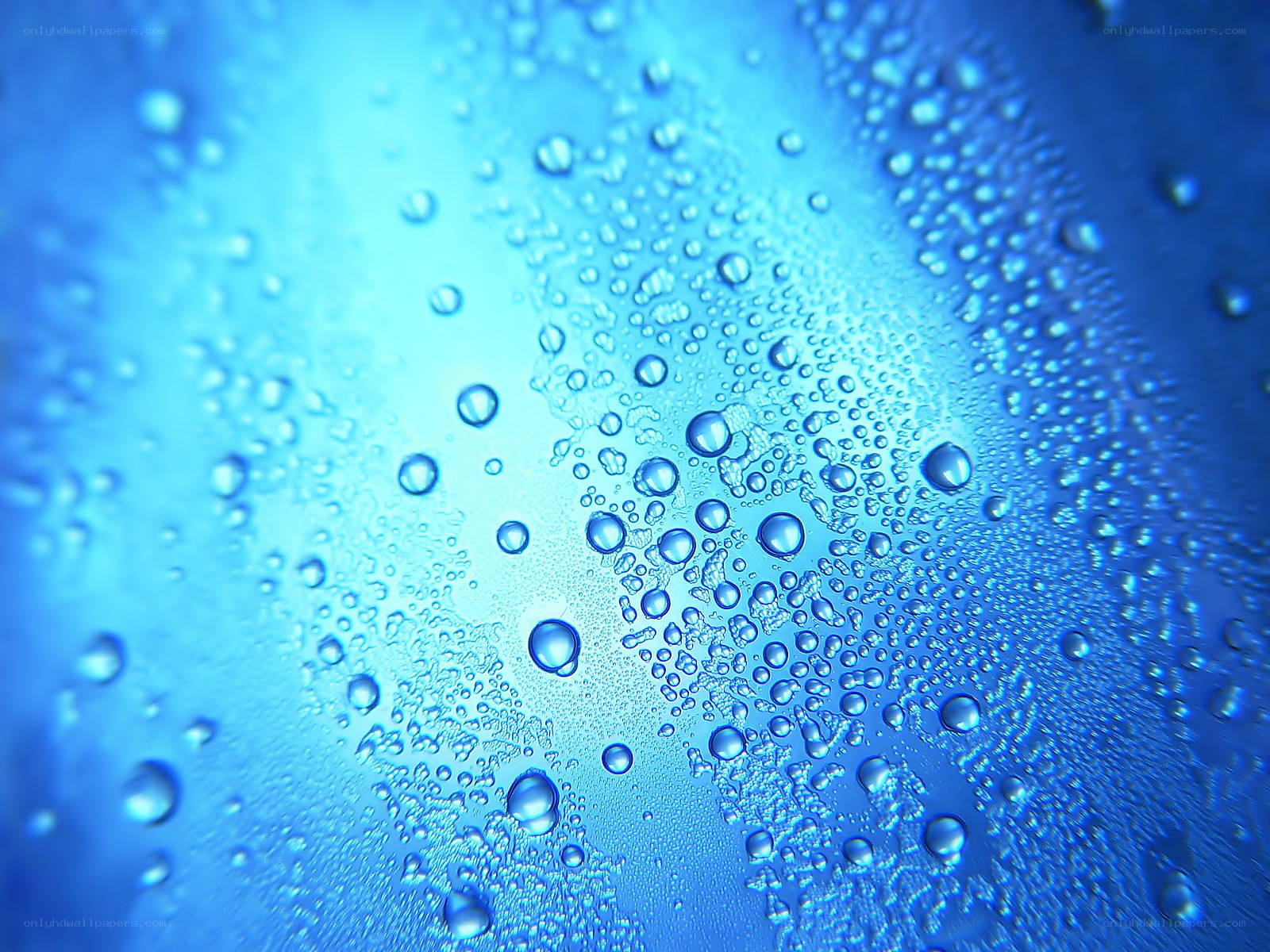 Water droplets on blue surface