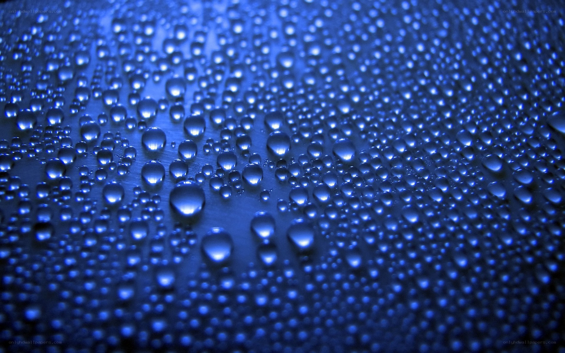 Water droplets on blue surface