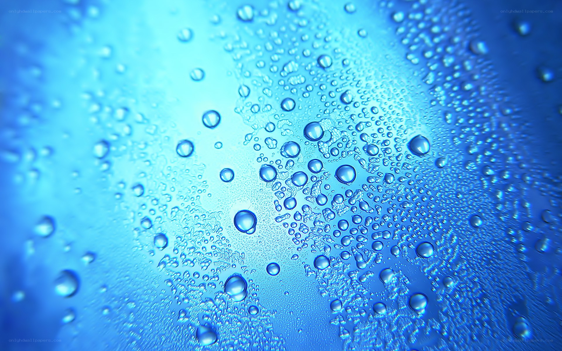 Water droplets on blue surface