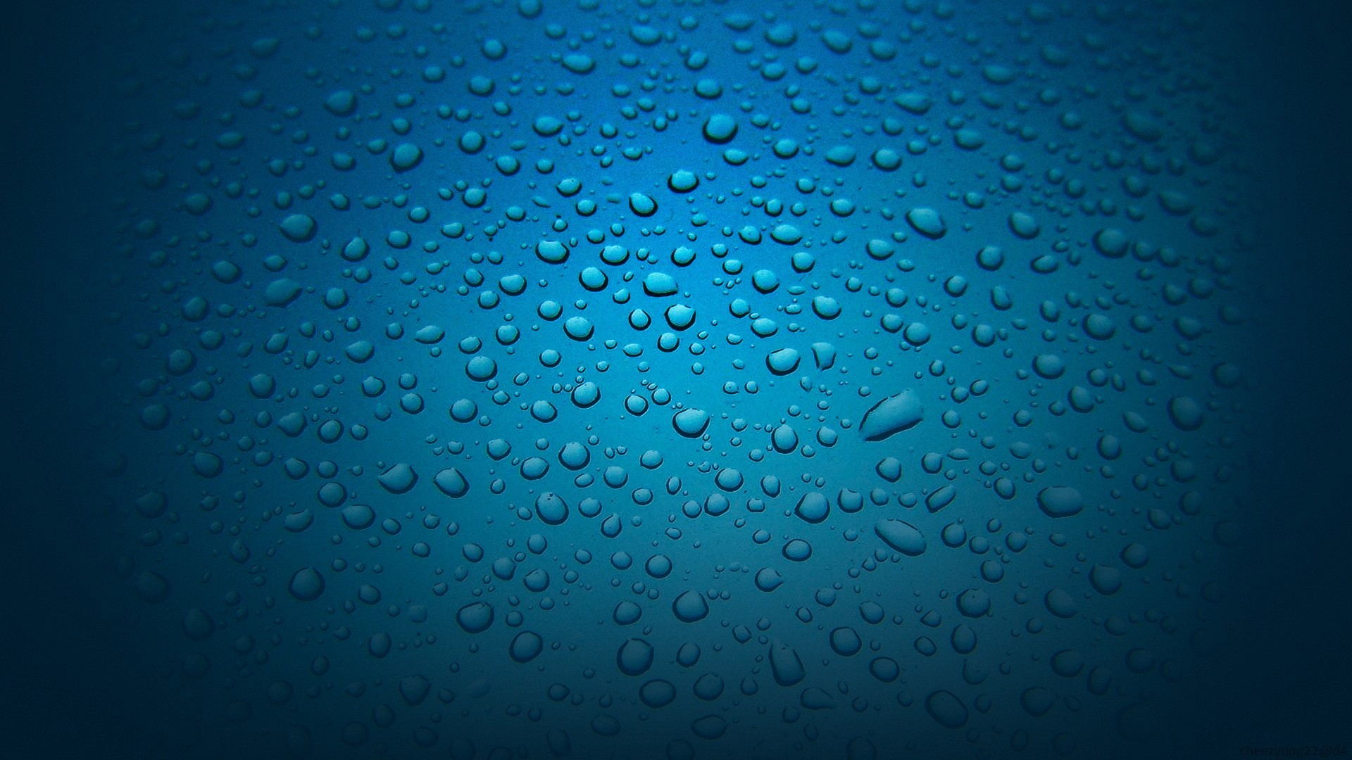 Water droplets on blue surface