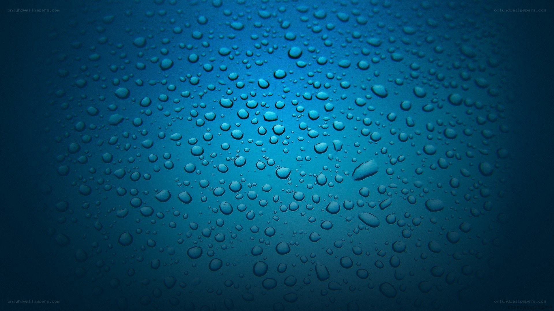 Water droplets on blue surface