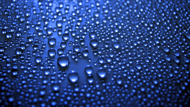 Water droplets on blue surface
