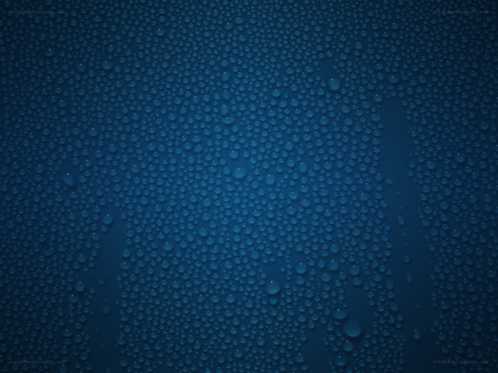 Water droplets on blue surface