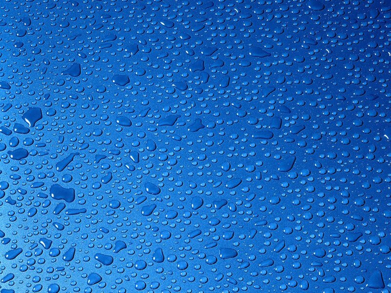 Water droplets on blue surface