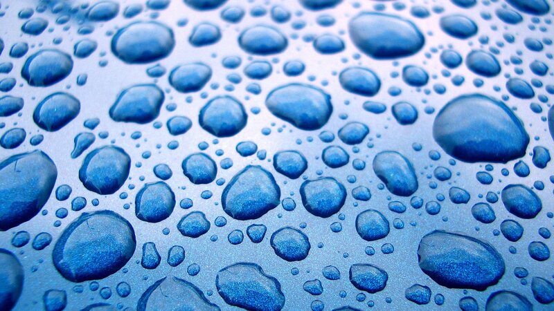 Water droplets on blue surface