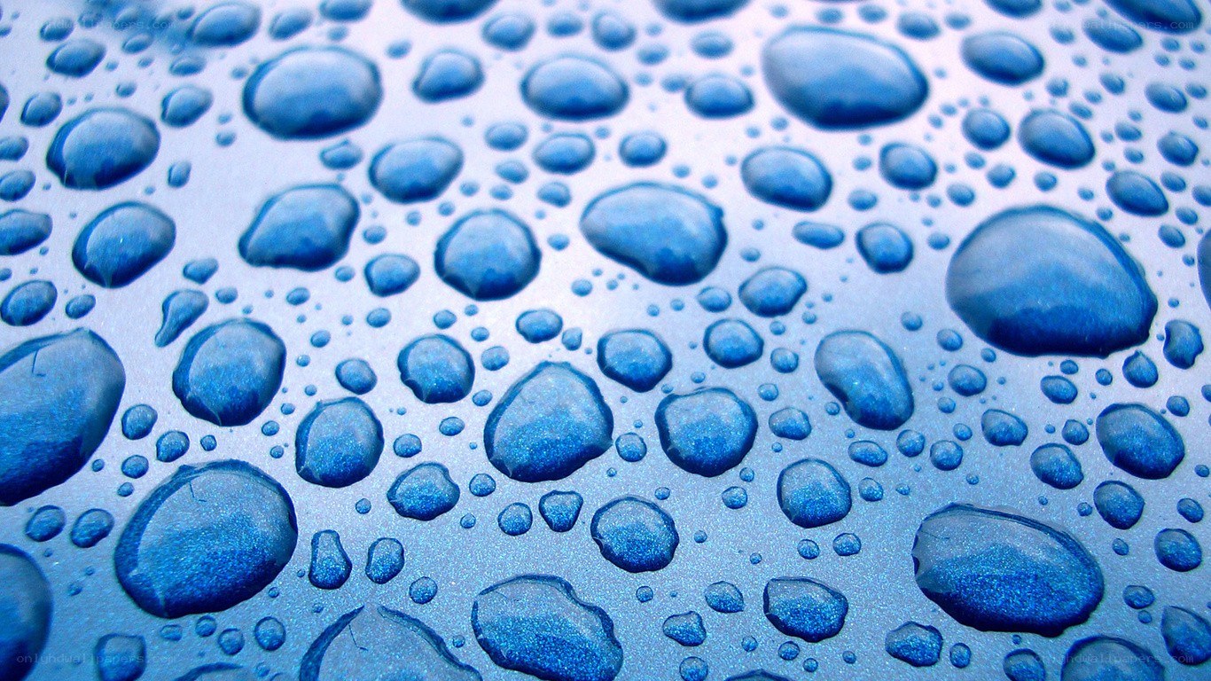 Water droplets on blue surface