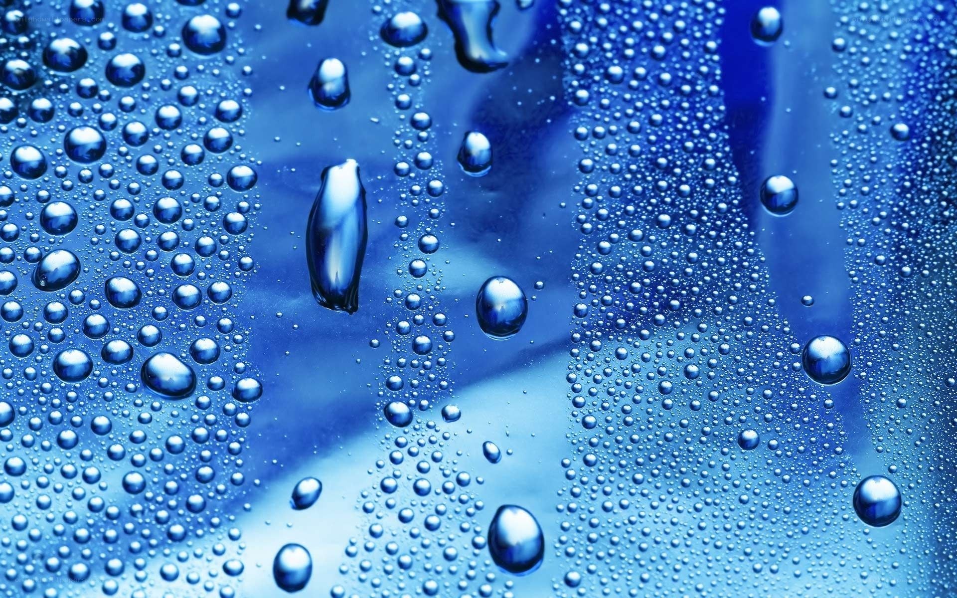 Water droplets on blue surface