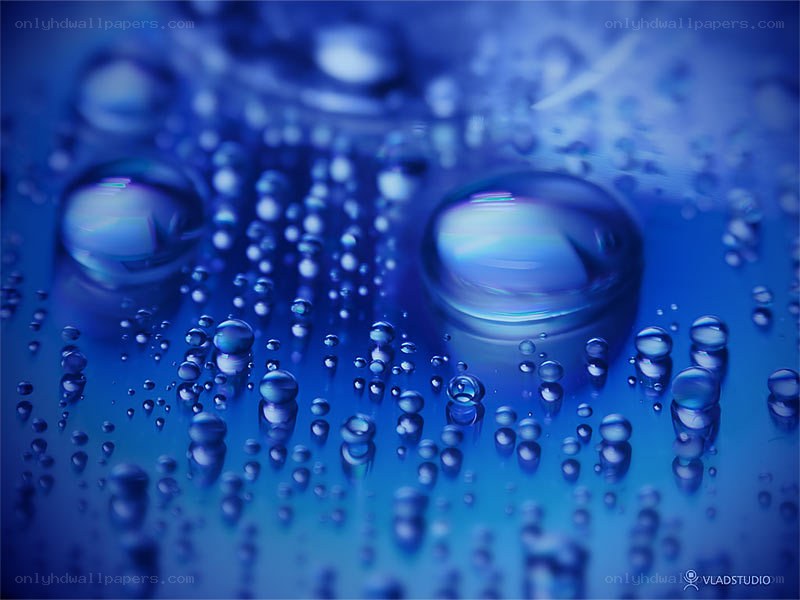 Water droplets on blue surface
