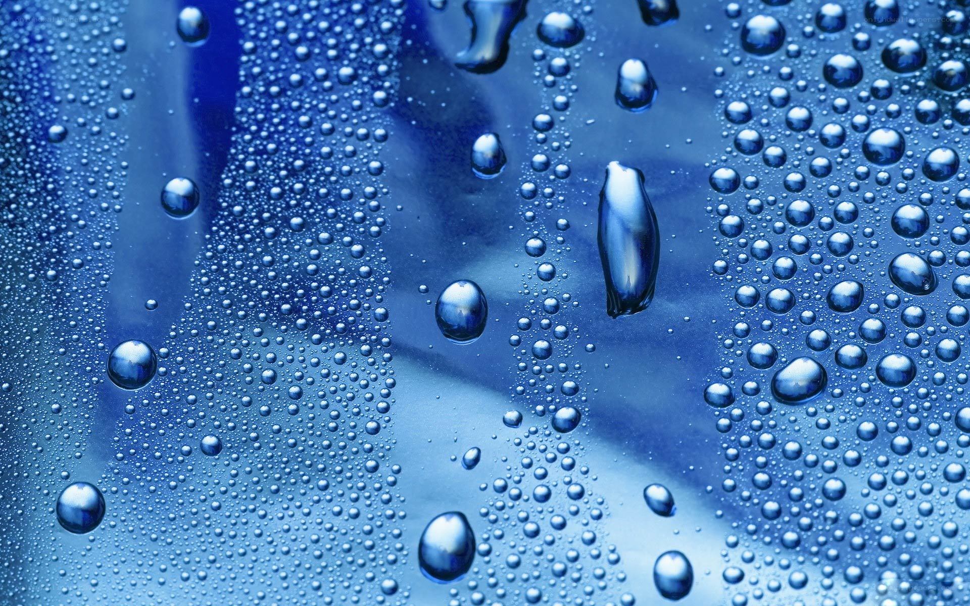 Water droplets on blue surface