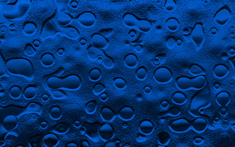 Water Droplets on Blue Surface — Calm