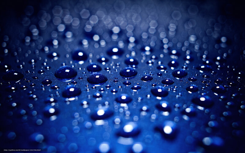 Water Droplets on Blue Surface — Dramatic