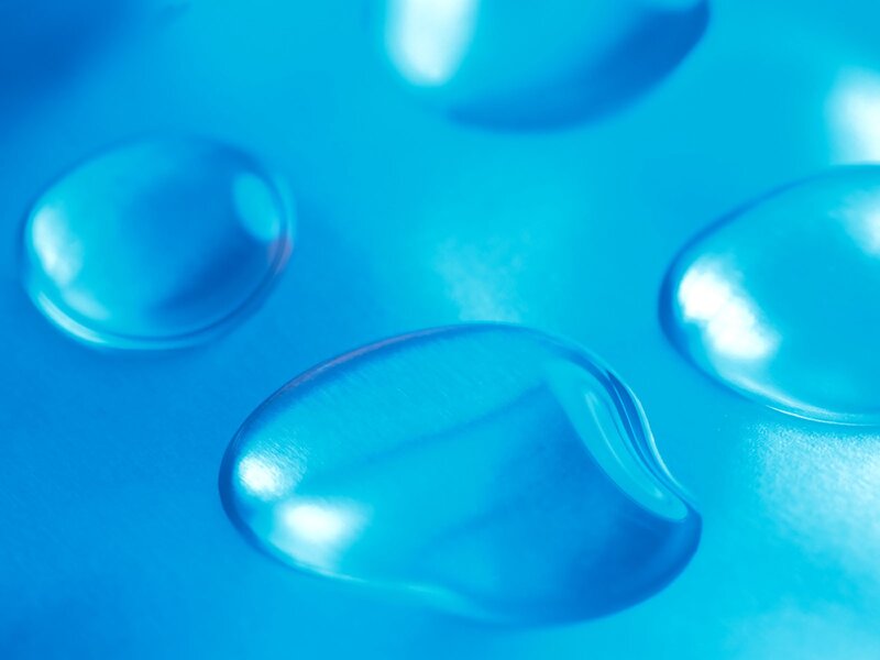 Water Droplets on Blue Surface — Droplet