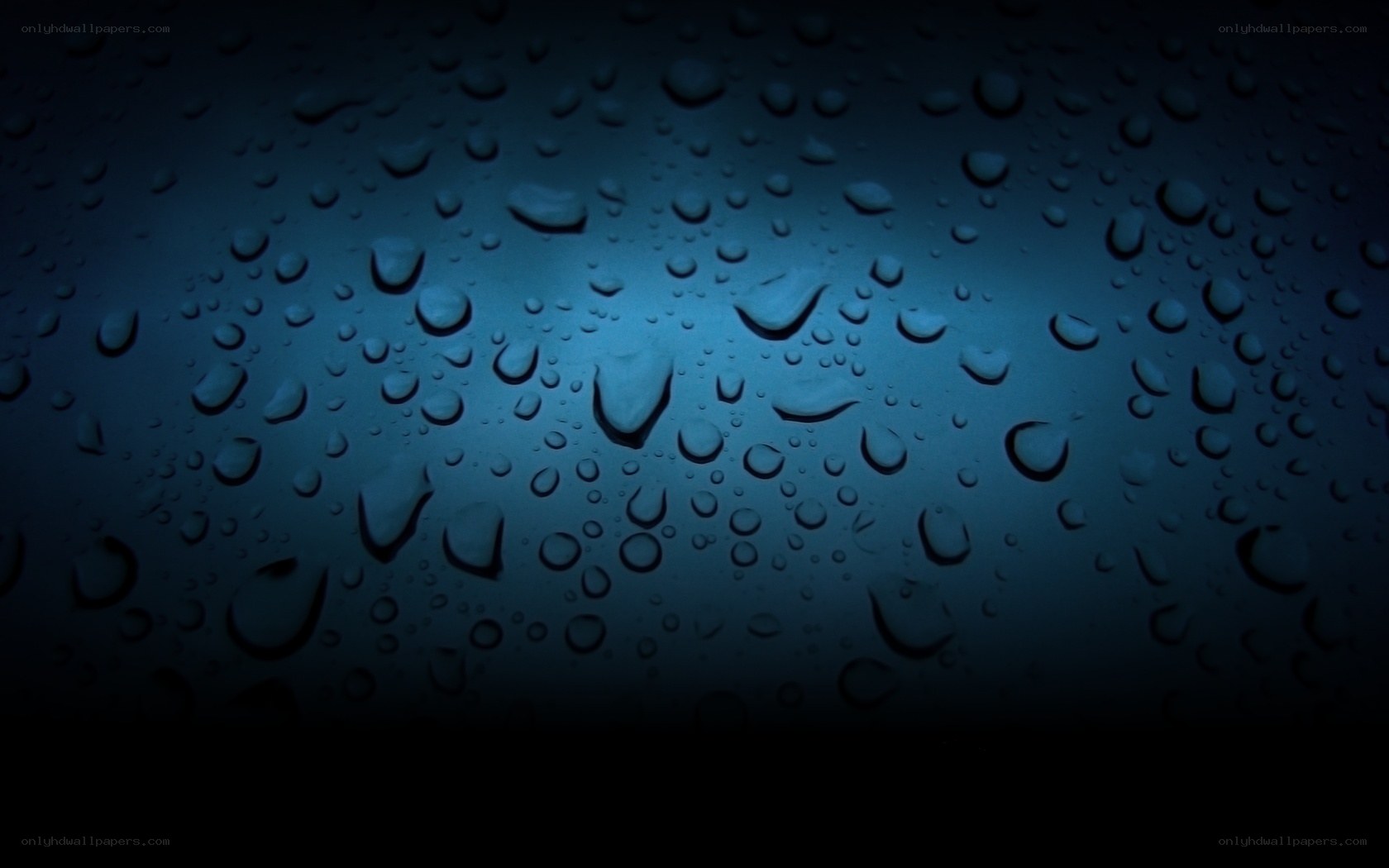 Water droplets on dark surface
