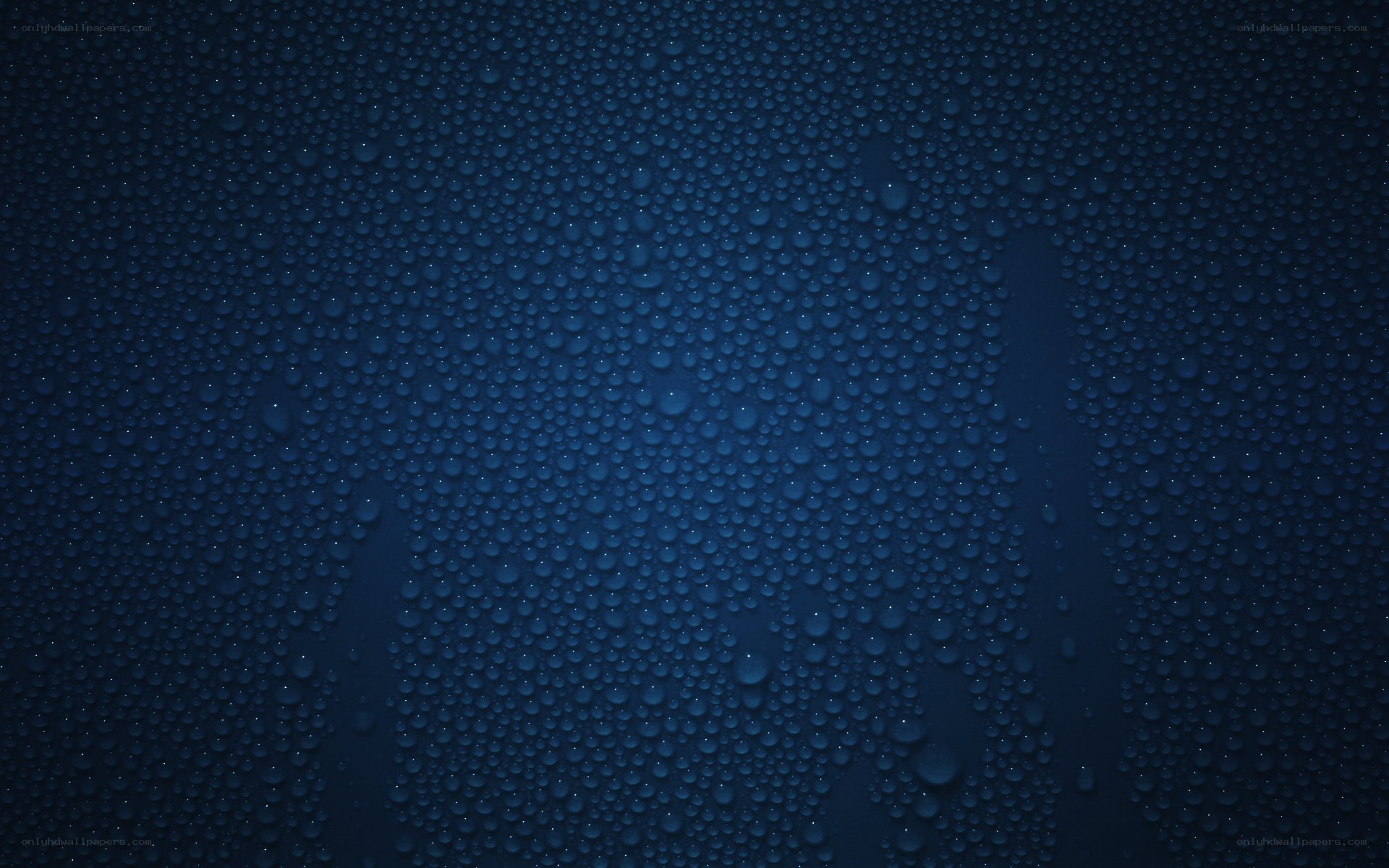 Water droplets on dark surface