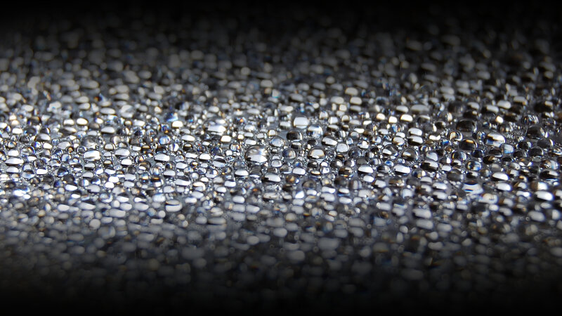 Water droplets on dark surface