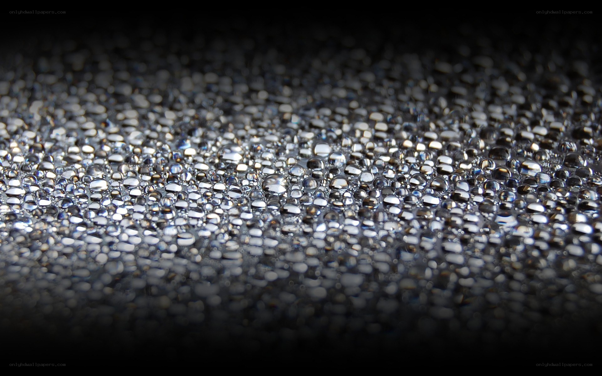 Water droplets on dark surface