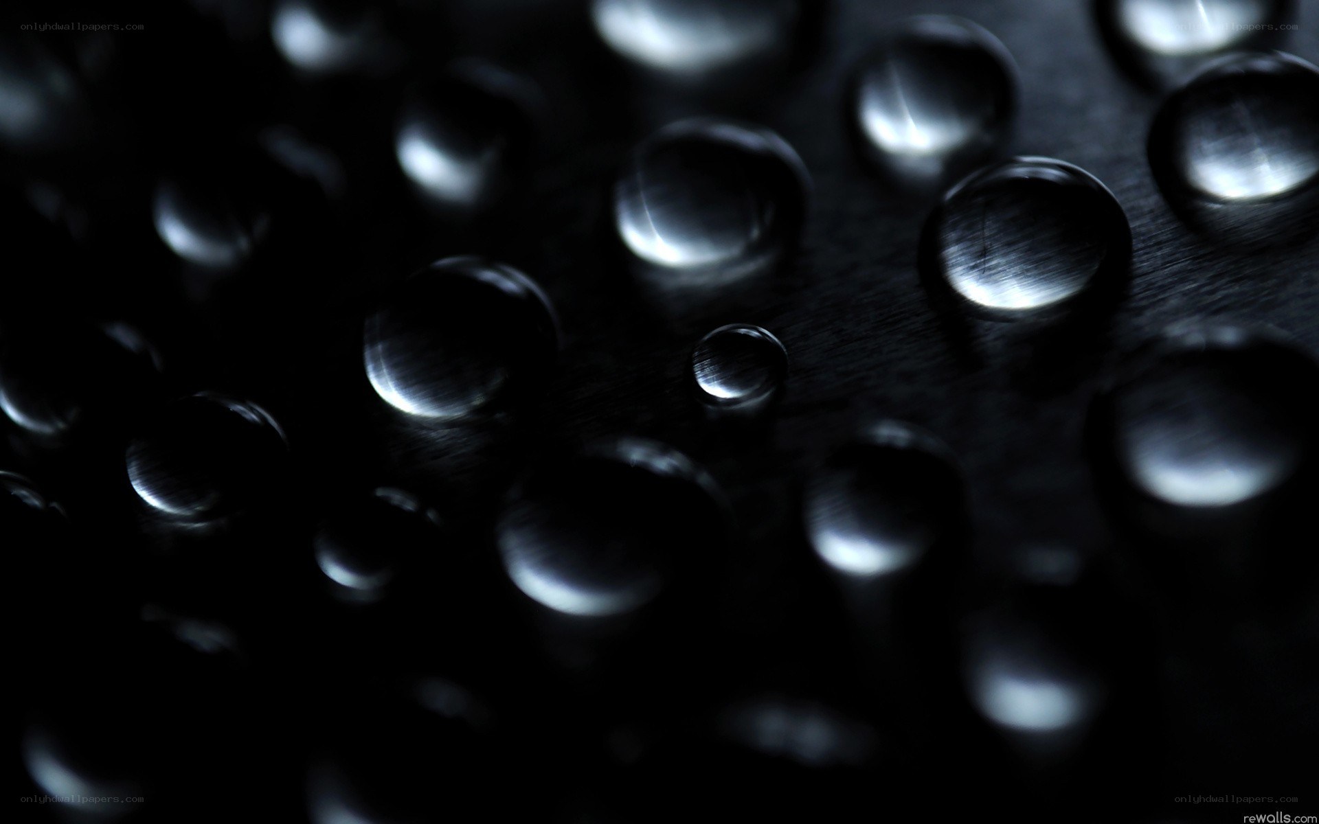 Water droplets on dark surface