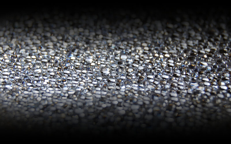 Water droplets on dark surface