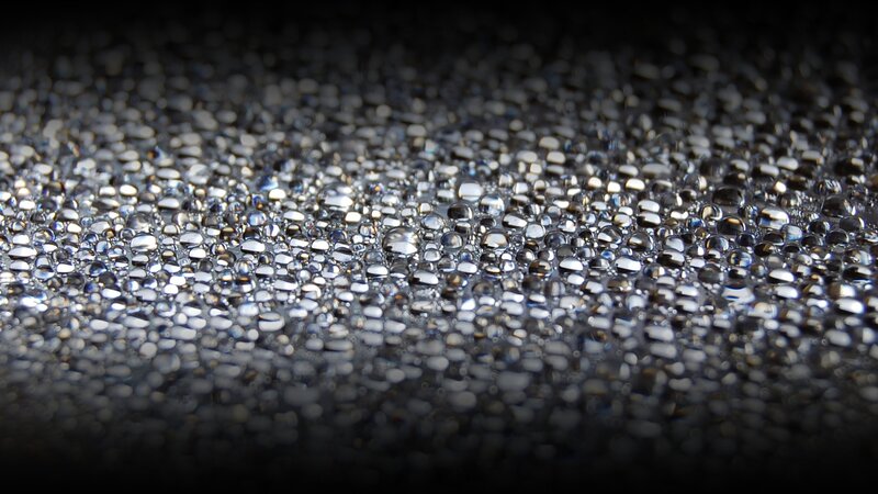 Water droplets on dark surface