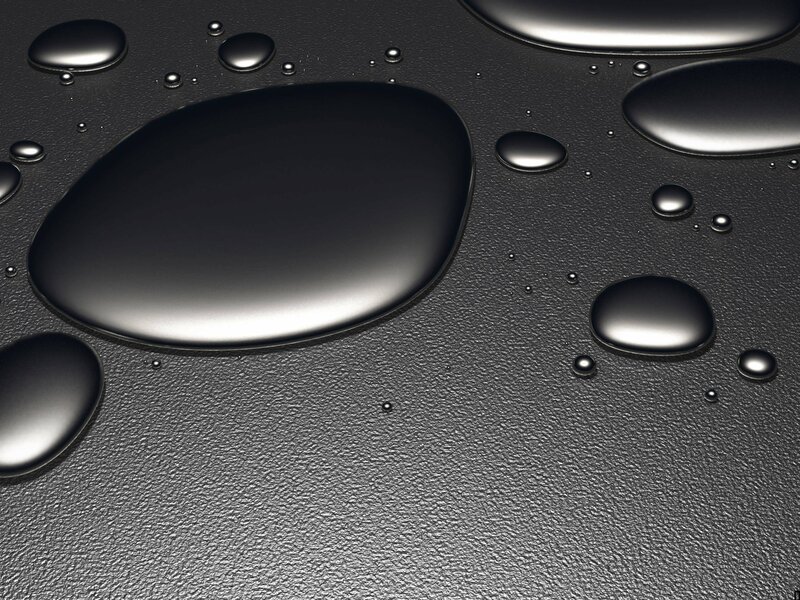 Water droplets on dark surface