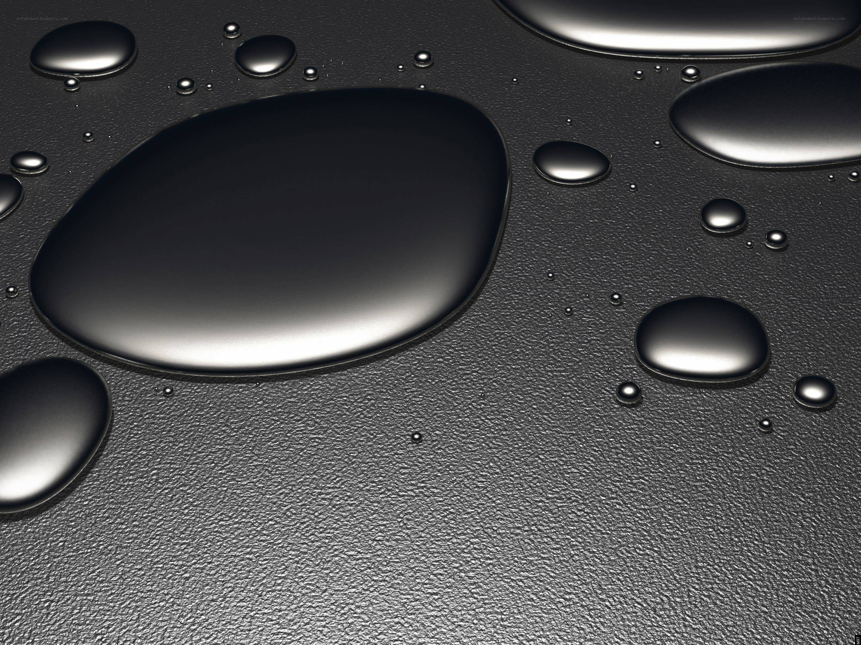 Water droplets on dark surface