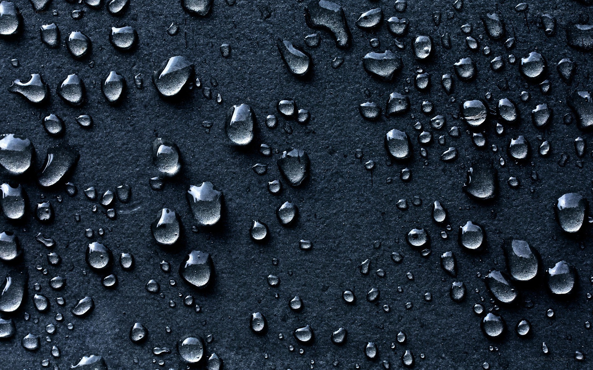 Water droplets on dark surface