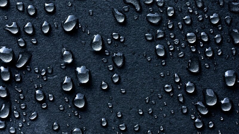 Water droplets on dark surface