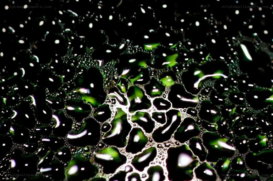 Water droplets on dark surface