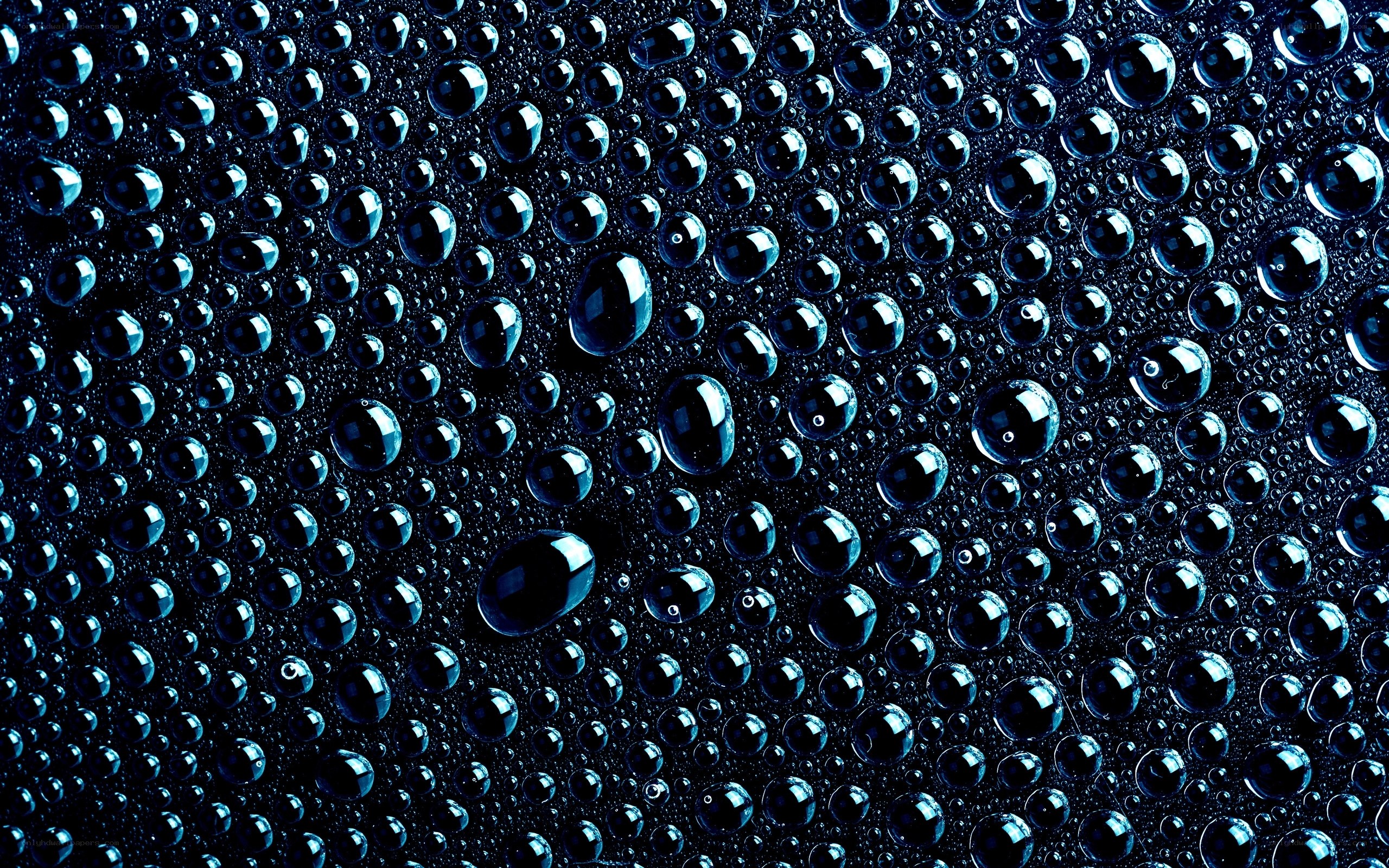 Water droplets on dark surface