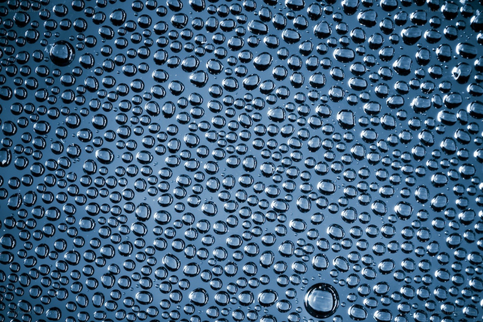 Water droplets on glass surface