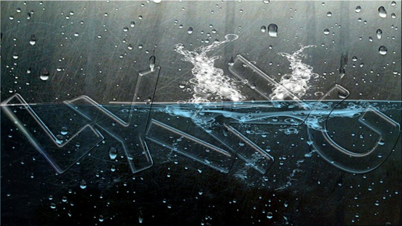 Water droplets on glass with text